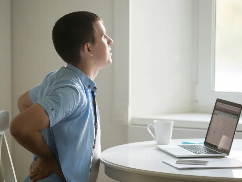 Wellness Revolution treating back pain in Evanston