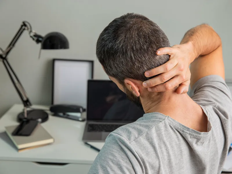 Wellness Revolution treating neck pain in Evanston